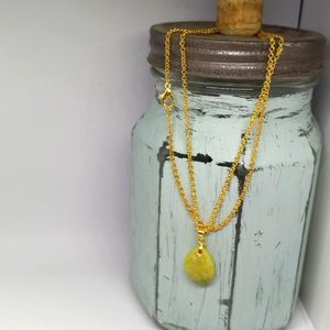Gold plated and yellow gem stone hand crafted necklace.